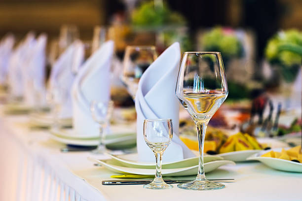 istock Close up picture of empty glasses in restaurant. Selective focus 493771412