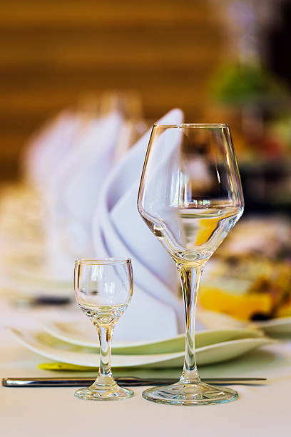 istock Close up picture of empty glasses in restaurant. Selective focus 493771458