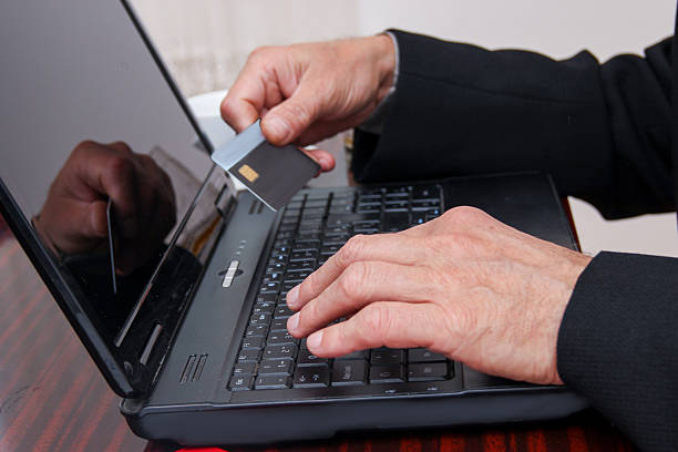 istock Close up of hands shopping online 493783772