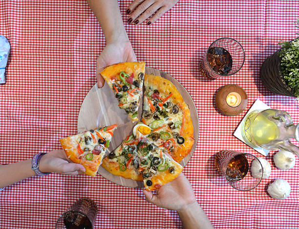 aerial view of family eating pizza
