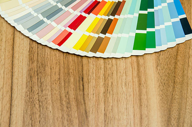 istock color palette guide on wooden board close up view 493785872