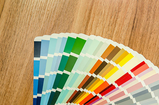 istock color palette guide on wooden board close up view 493785974