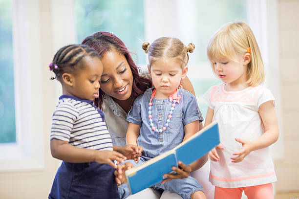 istock Reading a Story Book to Toddlers 493789730