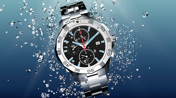 metal wrist watch is under water.