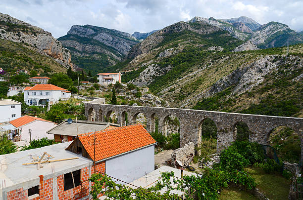 istock Aqueduct in the mountains in Old Bar, Montenegro 493793390