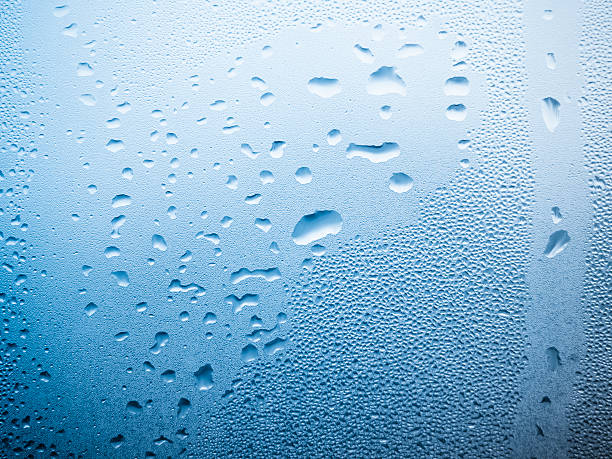 istock water drops on the glass 493795633