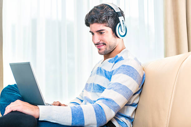 istock Young man enjoying music 493795669