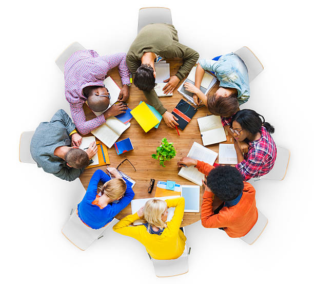 istock Group of Tired Students Sleeping on the Table 493796109