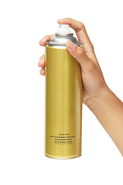 istock Hand holding a spray can isolated over white background 493797601