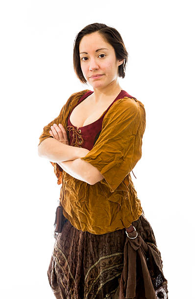 istock Young woman smiling with her arms crossed 493800083