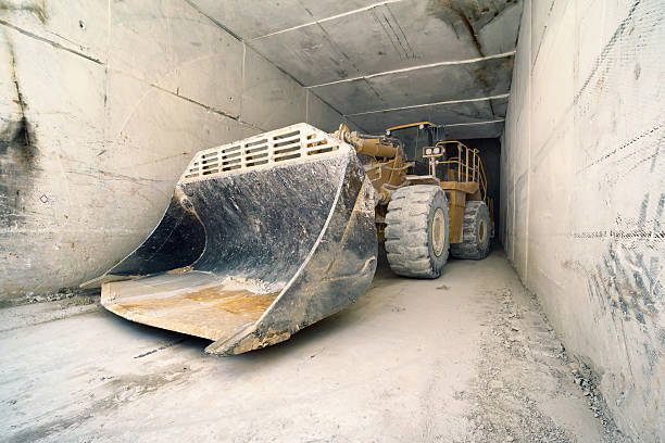 istock big bulldozer in marble tunnel, Carrara, Italy 493800857