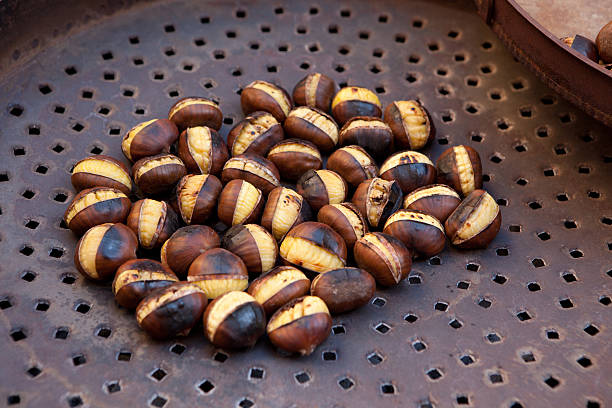 Roasted chestnuts stock photo