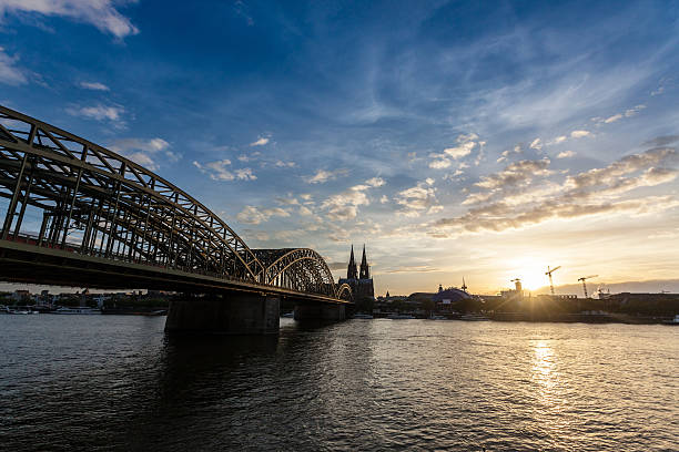 istock Cologne Cathedral and hohenzollern Bridge at Sunset 493802551
