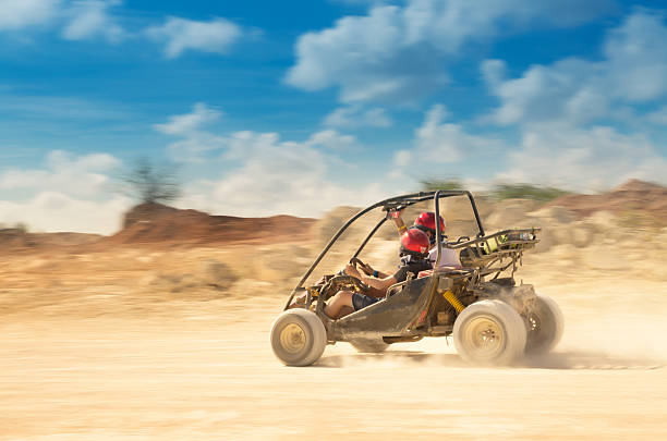 istock father and son driving a 4x4 493803155