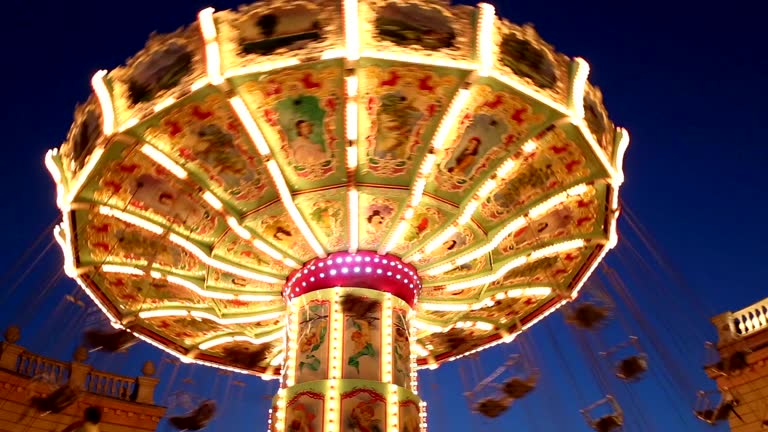 Swing chairs in amusement park