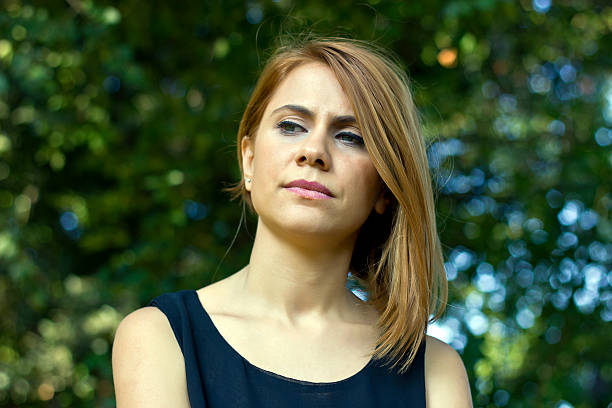 istock young woman looking angry 493828426