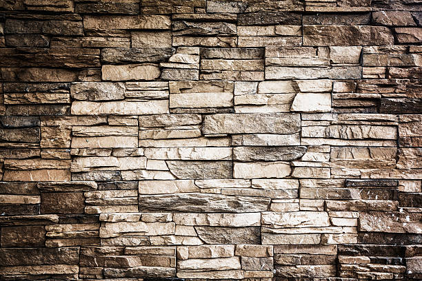 istock Background of stone wall texture photo 493829475
