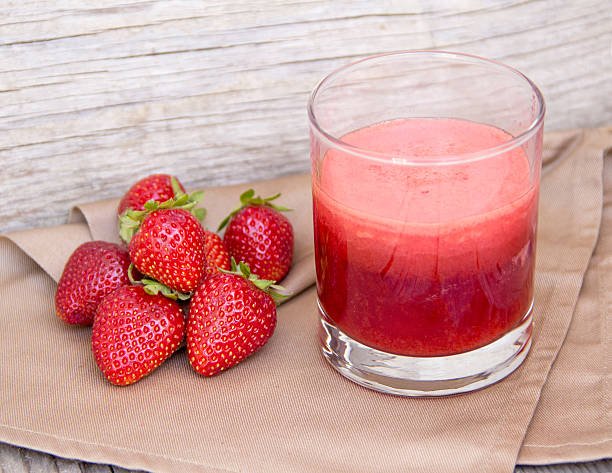istock Fresh strawberry smoothie juice and strawberries 493830509