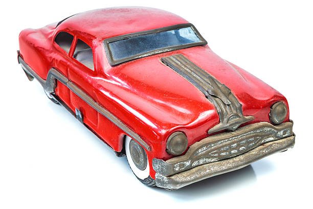 istock Fifties vintage red car toy isolated on white 493830597