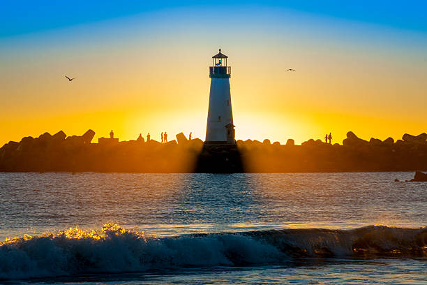 istock Light house with sunset in the background 493831989