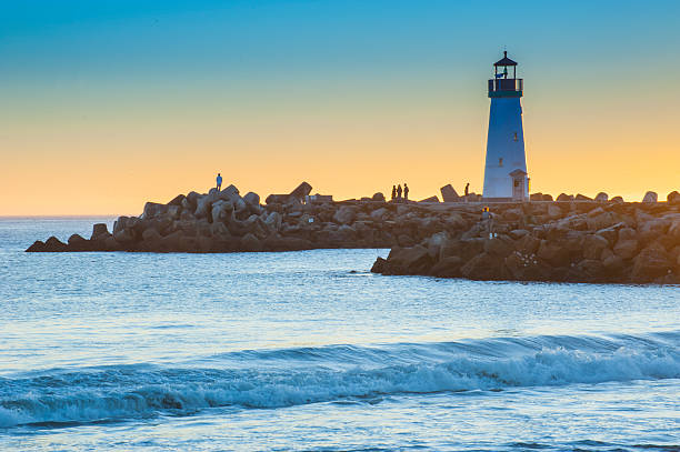 istock Light house with sunset in the background 493831997