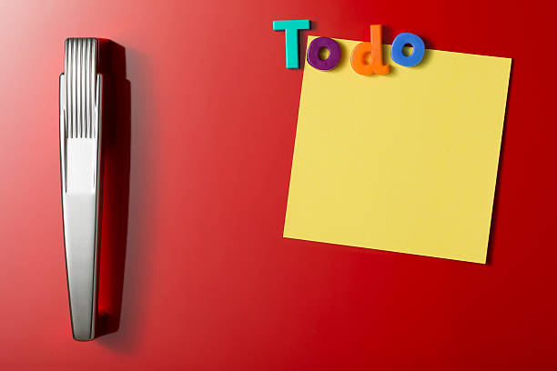 istock Blank TO DO post-it note on a red fridge door 493834299