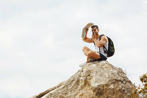 istock Young man tourist with a backpack 493834860
