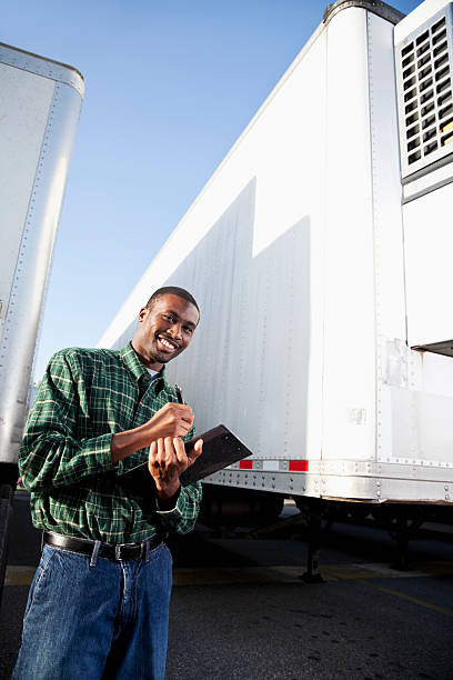 istock African American truck driver with clipboard 493834913