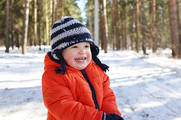 istock smiling 18 months baby walking in forest 493835455