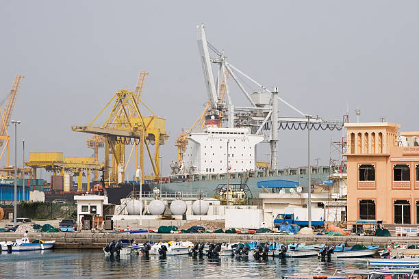 Scenes of Dubai Khor Fakkan, UAE, Large cargo ships docked to load and unload goods at Khor Fakkport fujairah stock pictures, royalty-free photos & images