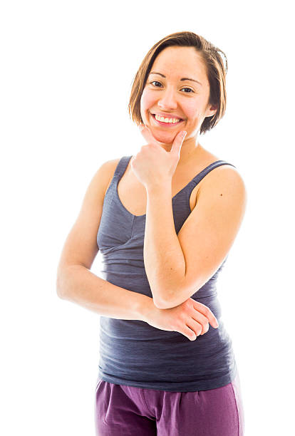 istock Young woman smiling with her hand on chin 493836713