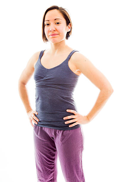 istock Young woman standing with her arms akimbo 493836789