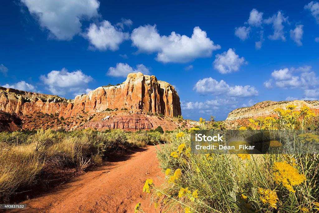 Late Day at Ghost Ranch Late afternoon in the Red Rocks area of Northern New Mexico featuring amazing colors and rock formations New Mexico Stock Photo