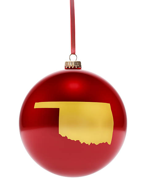 istock Red bauble with the golden shape of Oklahoma.(series) 493838486