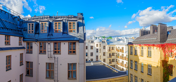 Photo of old apartment buildings and rooftops in downtown Helsinki, Finland.