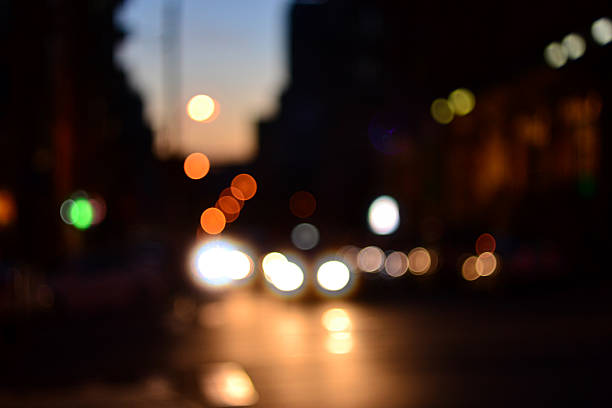 istock Evening city cars defocused lights background 493839552