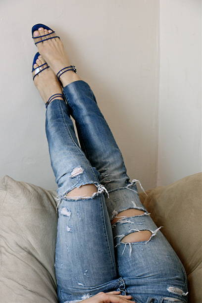 istock Ripped Jeans and Blue High Heels: Legs 493850269