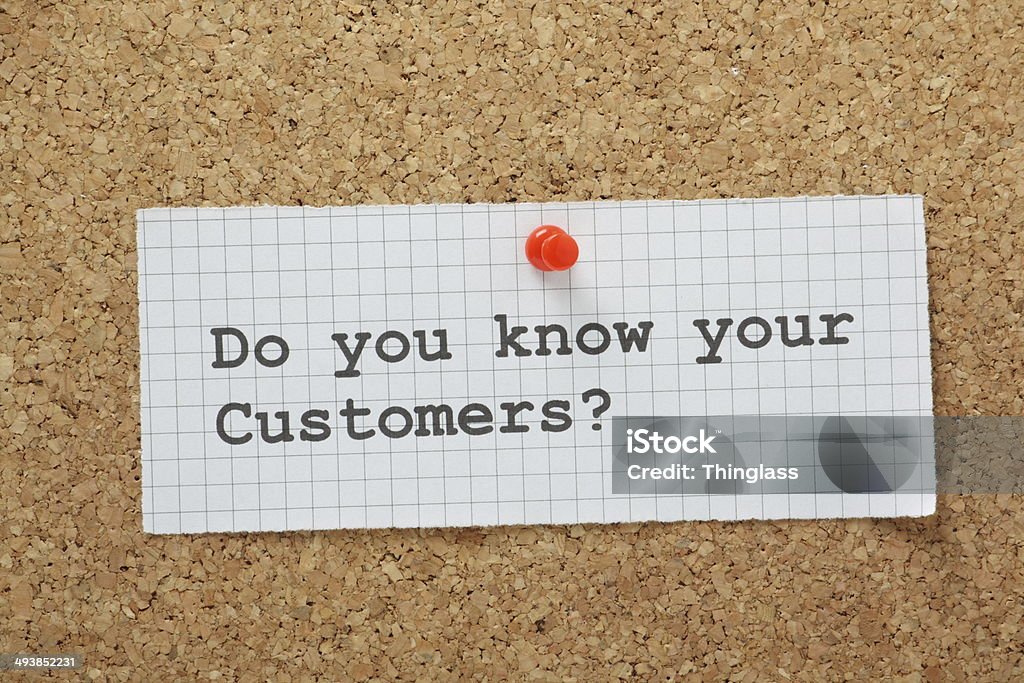 Know Your Customers The phrase Do You Know Your Customers typed on a piece of graph paper and pinned to a cork notice board Customer Stock Photo