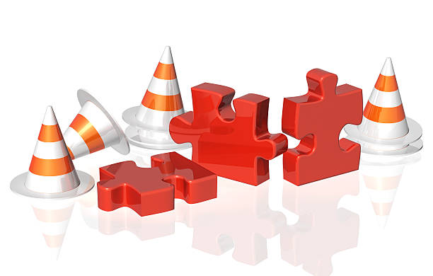 istock Road cones and part of puzzle 493853531