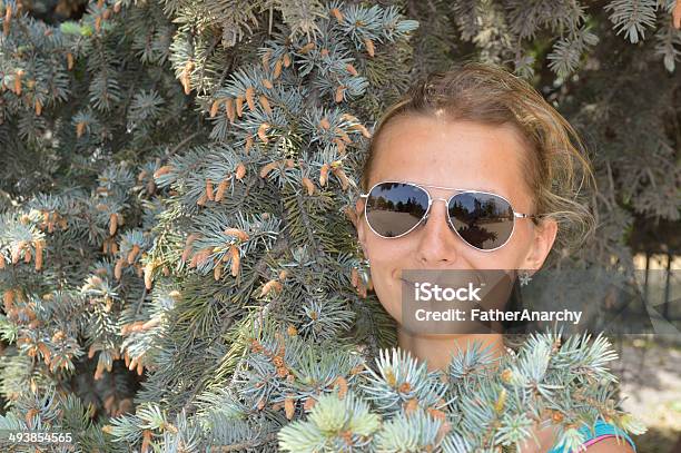 Beautiful Girl In Branchs Of Blue Spruce Stock Photo - Download Image Now - Child, Children Only, Crimea