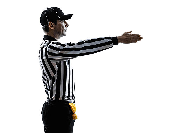 american football referee gestures first down silhouette american football referee gestures first down in silhouette on white background referee stock pictures, royalty-free photos & images