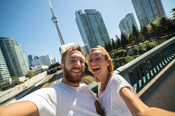 istock Young people taking selfie portrait in Toronto 493856014