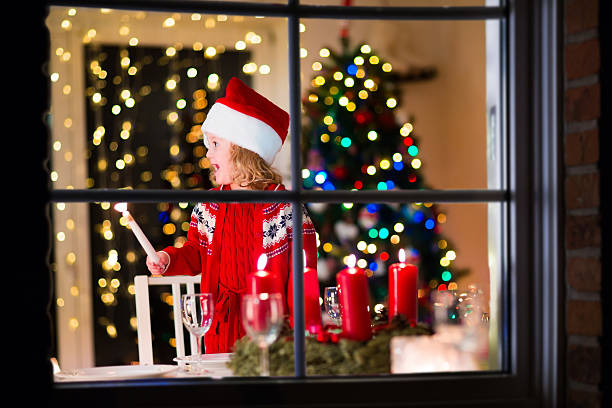 istock Child at family Christmas dinner at home 493857768