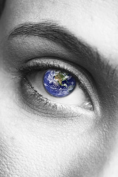 istock Human eye with earth close up 493859188