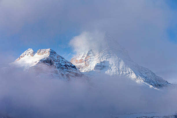 istock Pyramid Shaped Mount Assiniboine in the Fog 493861528