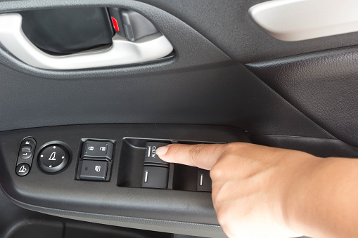 Hand push button mirror in car 