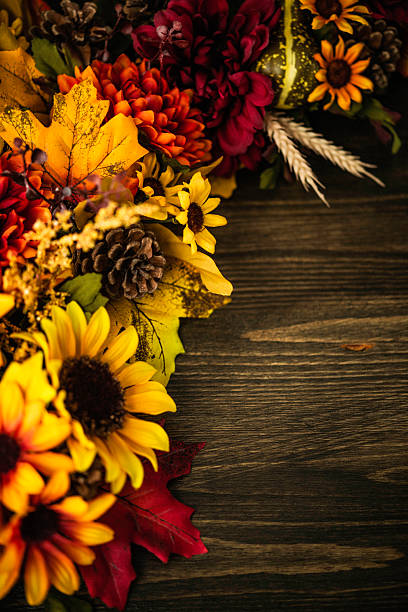 istock Fall themed decorations forming border on wooden background. Thanksgiving celebrations. 493865532