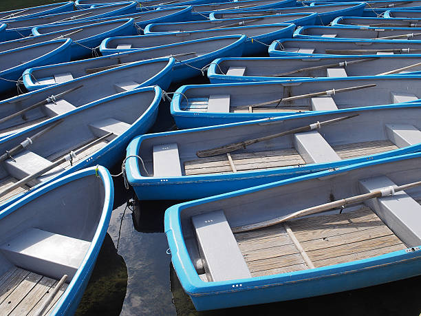 istock group of blue rowboat at river 493866092