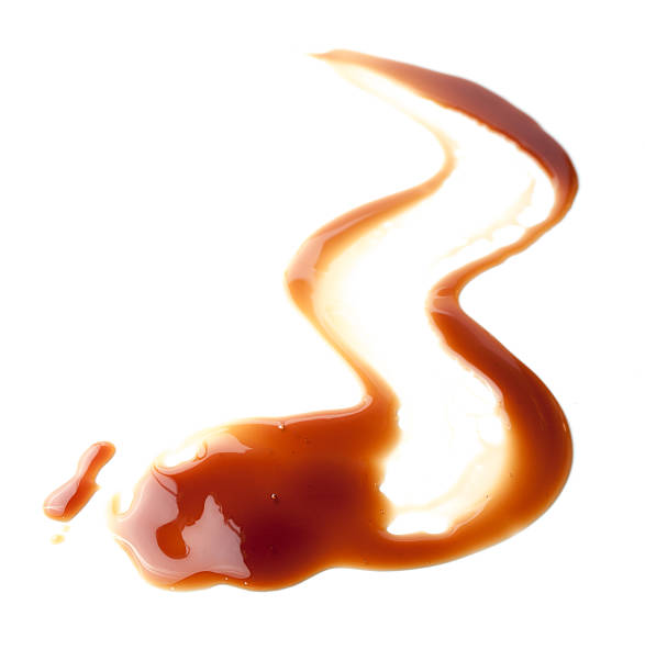 istock Sweet caramel sauce on a white background 493869550