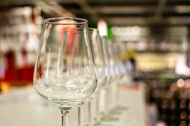 istock wine glass on table in bar 493869974